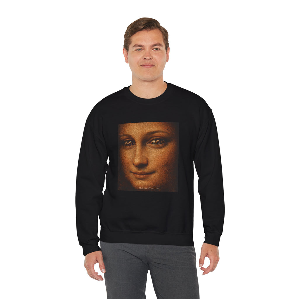man wearing a black sweatshirt showing a reimagined image of Da Vinci's Mona Lisa on a white background