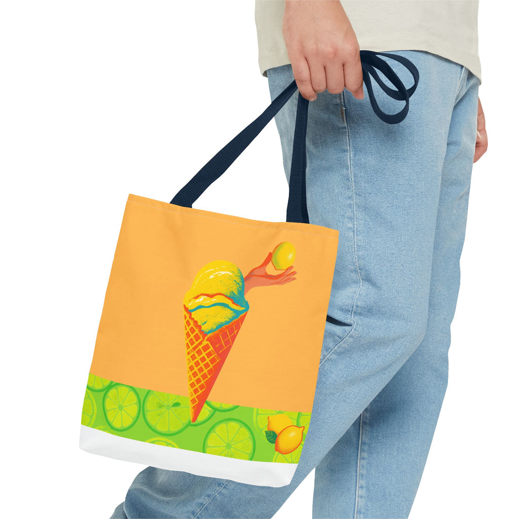 Tote bag with ice cream cone design held by a person wearing jeans