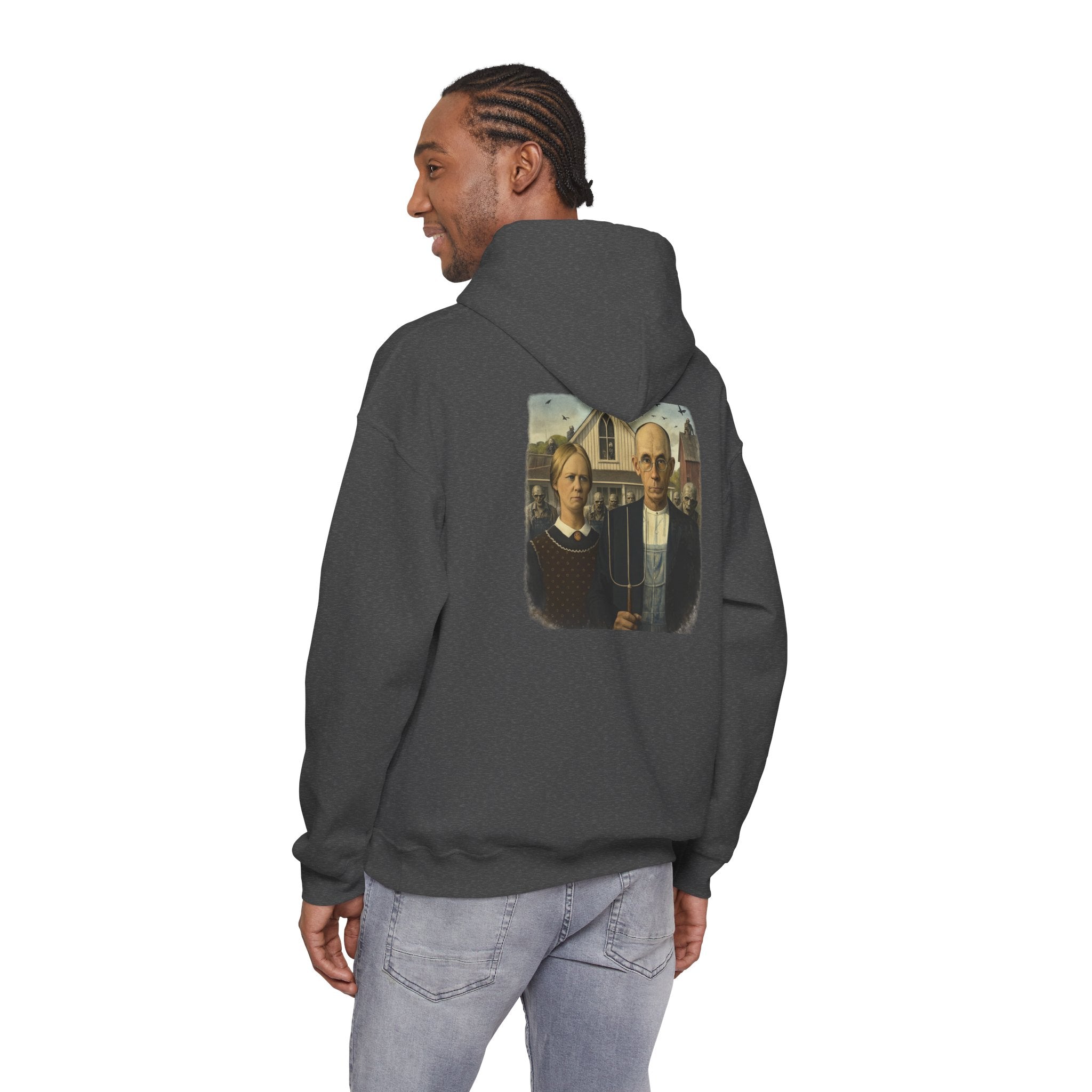 Man wearing heather hoodie with a graphic of a  reimagined American Gothic by Grant Wood on the back, displayed on a white background.