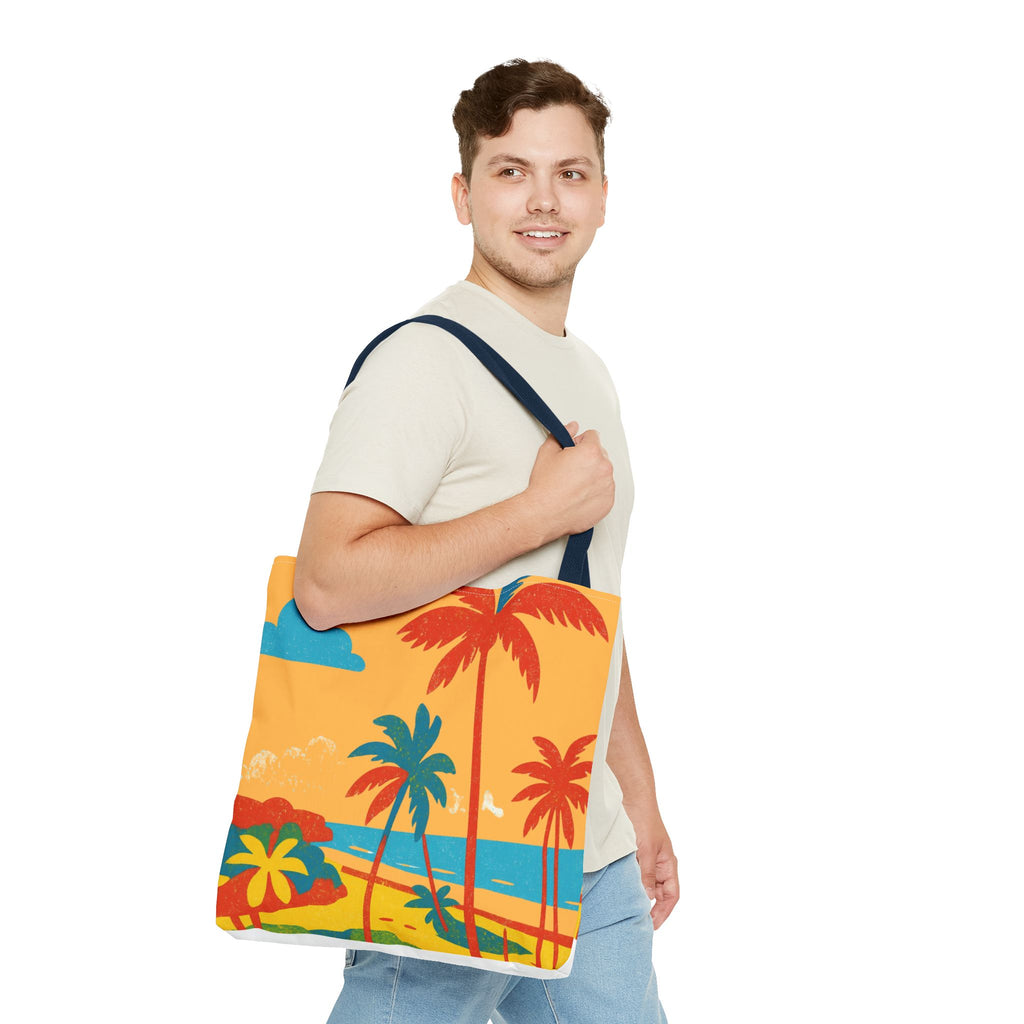 Man in white tshirt and jeans holding a colourful tote bag with a beach sign inspired by St Philip in Barbados on a white background