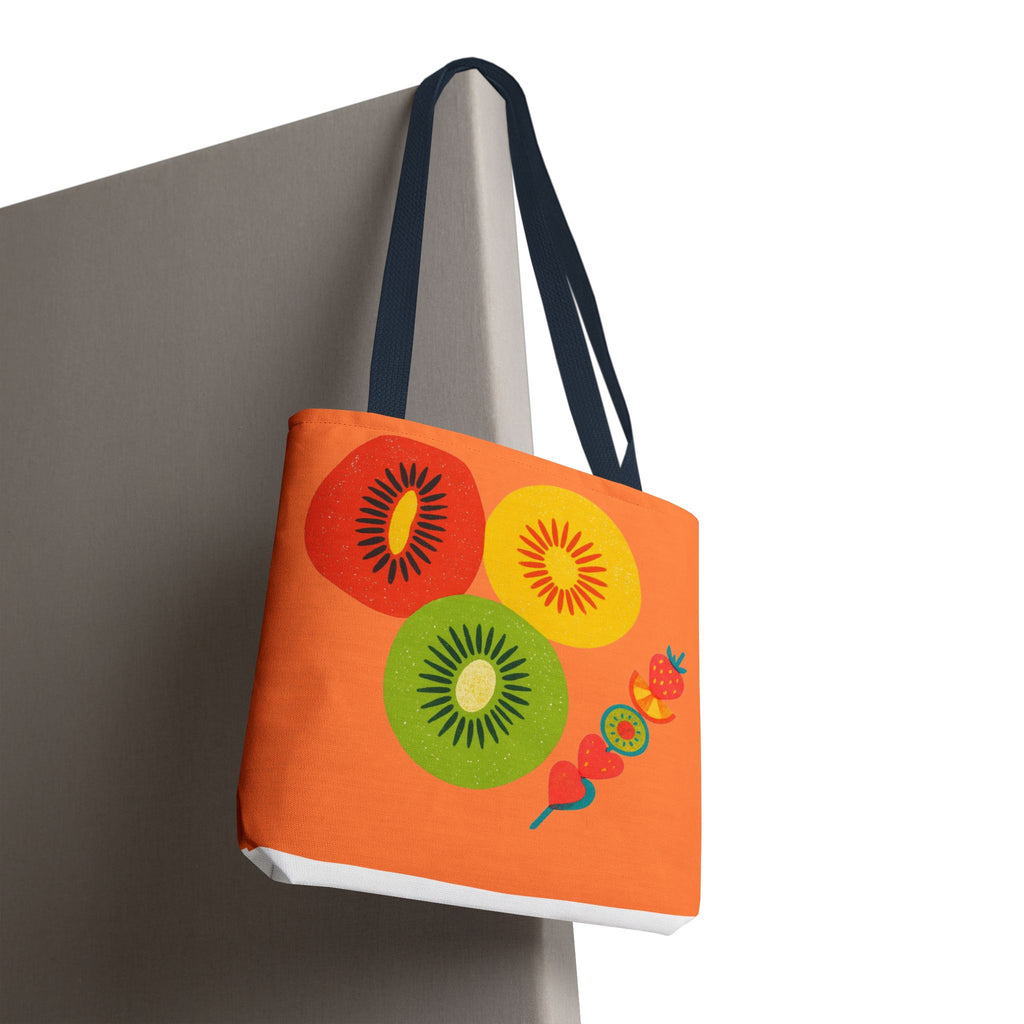 Orange tote bag with fruit design on a white background
