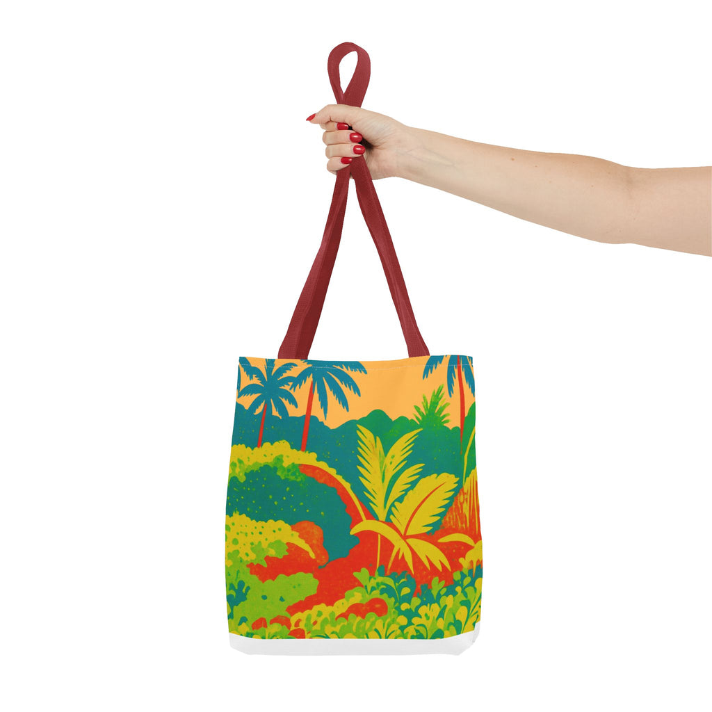 Tote bag with a colorful tropical design inspired by St Joseph in Barbados held by a hand on a white background