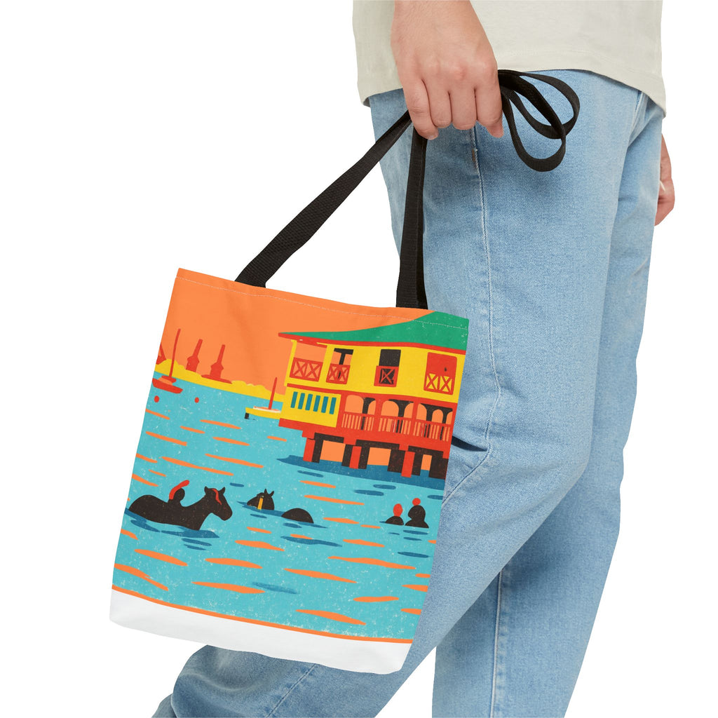 Man carrying a colourful tote bag showing a scene of horses swimming at Pebbles Beach, Barbados 