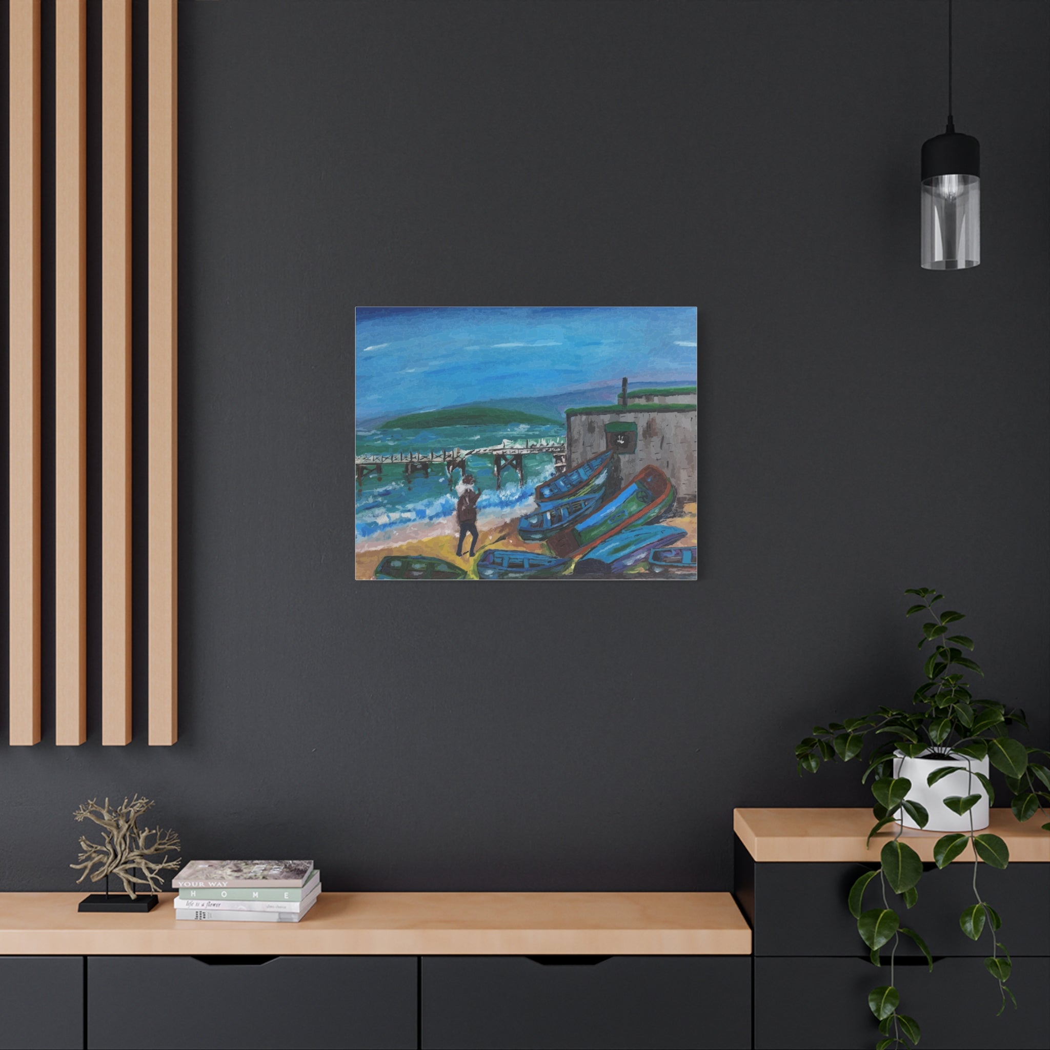 Artistic depiction of a coastal scene with boats on a dark wall, with a wooden shelf and plant in the foreground.