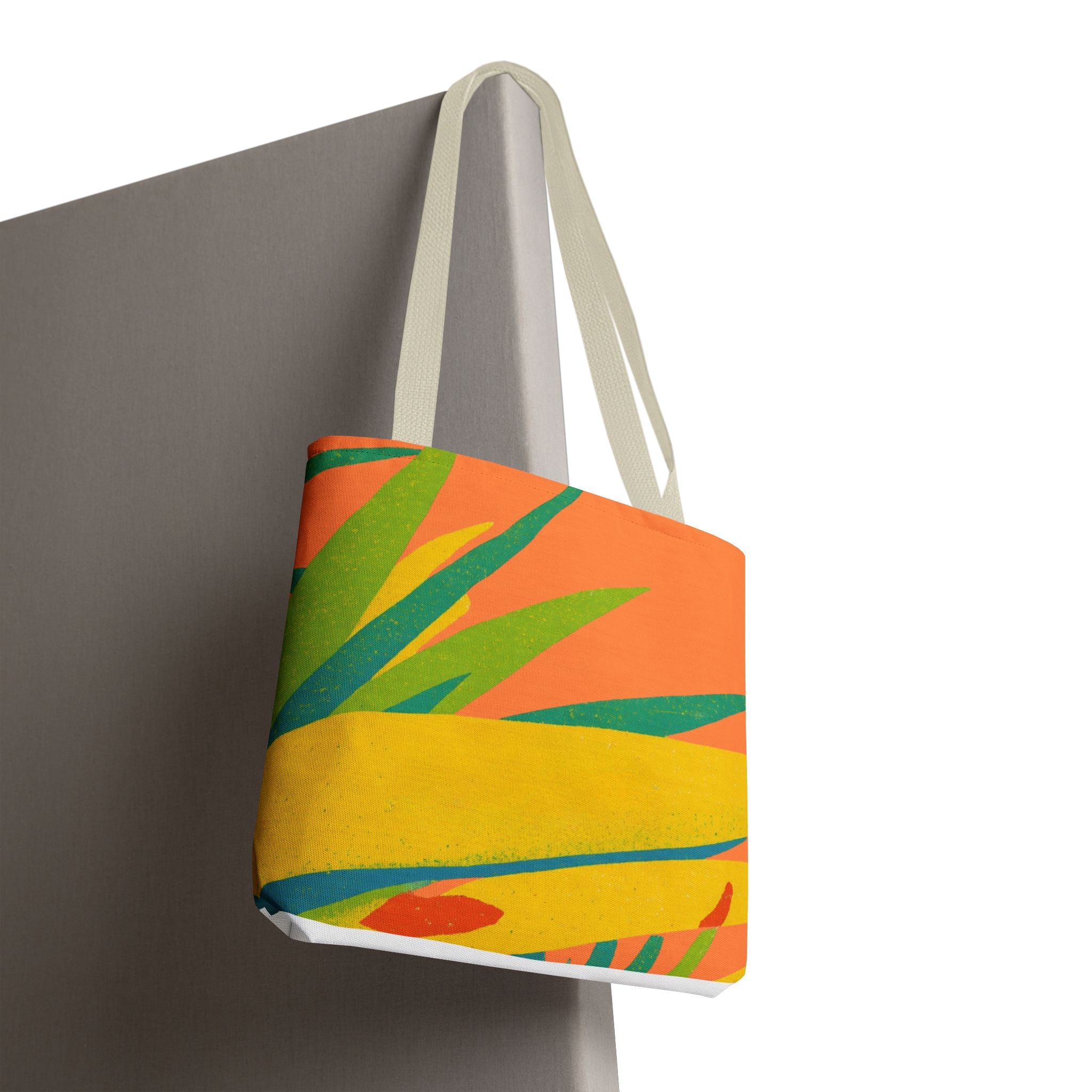 Colorful tote bag with tropical design inspired by Ragged Point, St Philip, Barbados on a white background