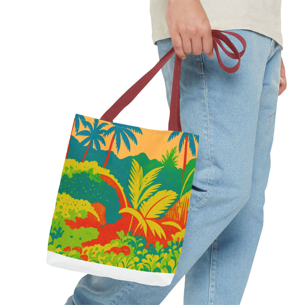 Tote bag with tropical design inspired by St Joseph in Barbados held by a person wearing jeans