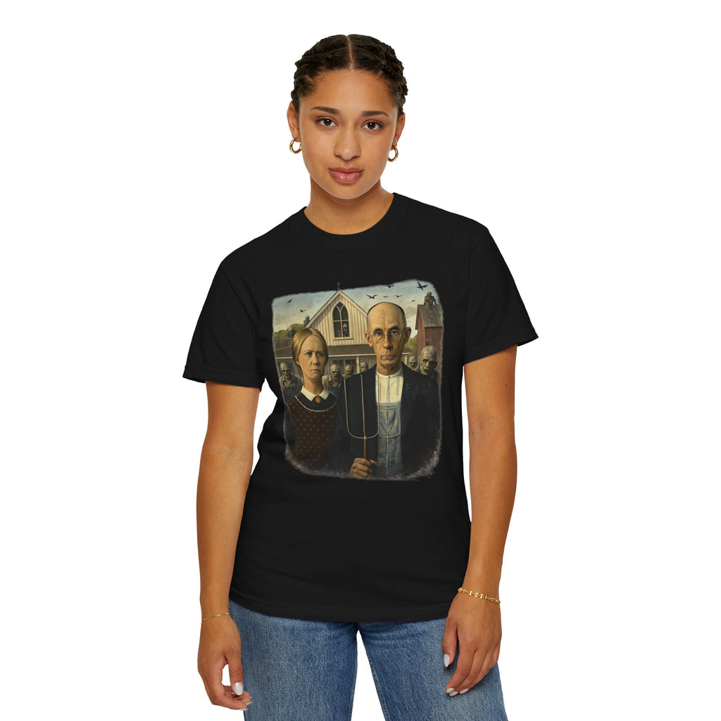 Person wearing black t-shirt with reimagined image of zombies in American Gothic by Grant Wood on a white background