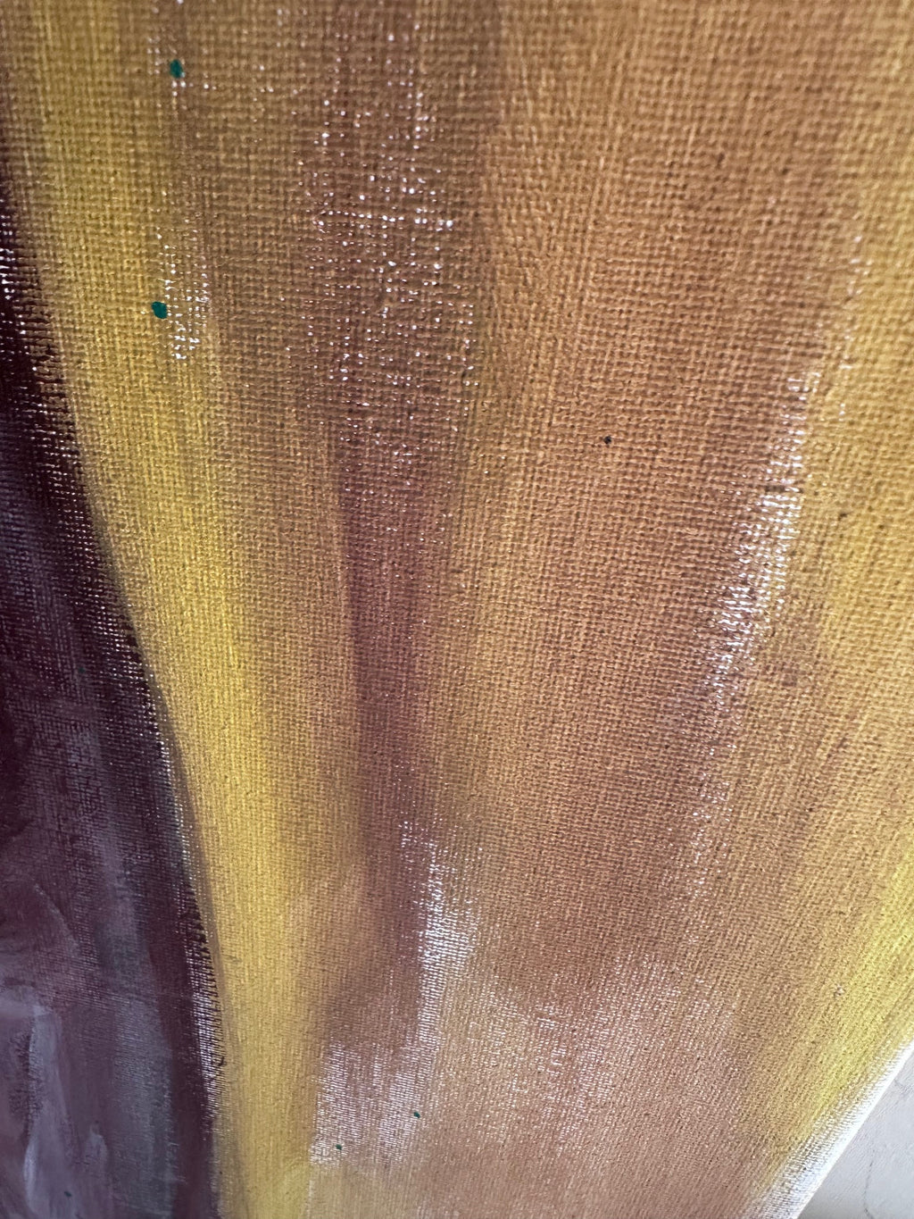 Close-up of a painting with yellow background and nude figure