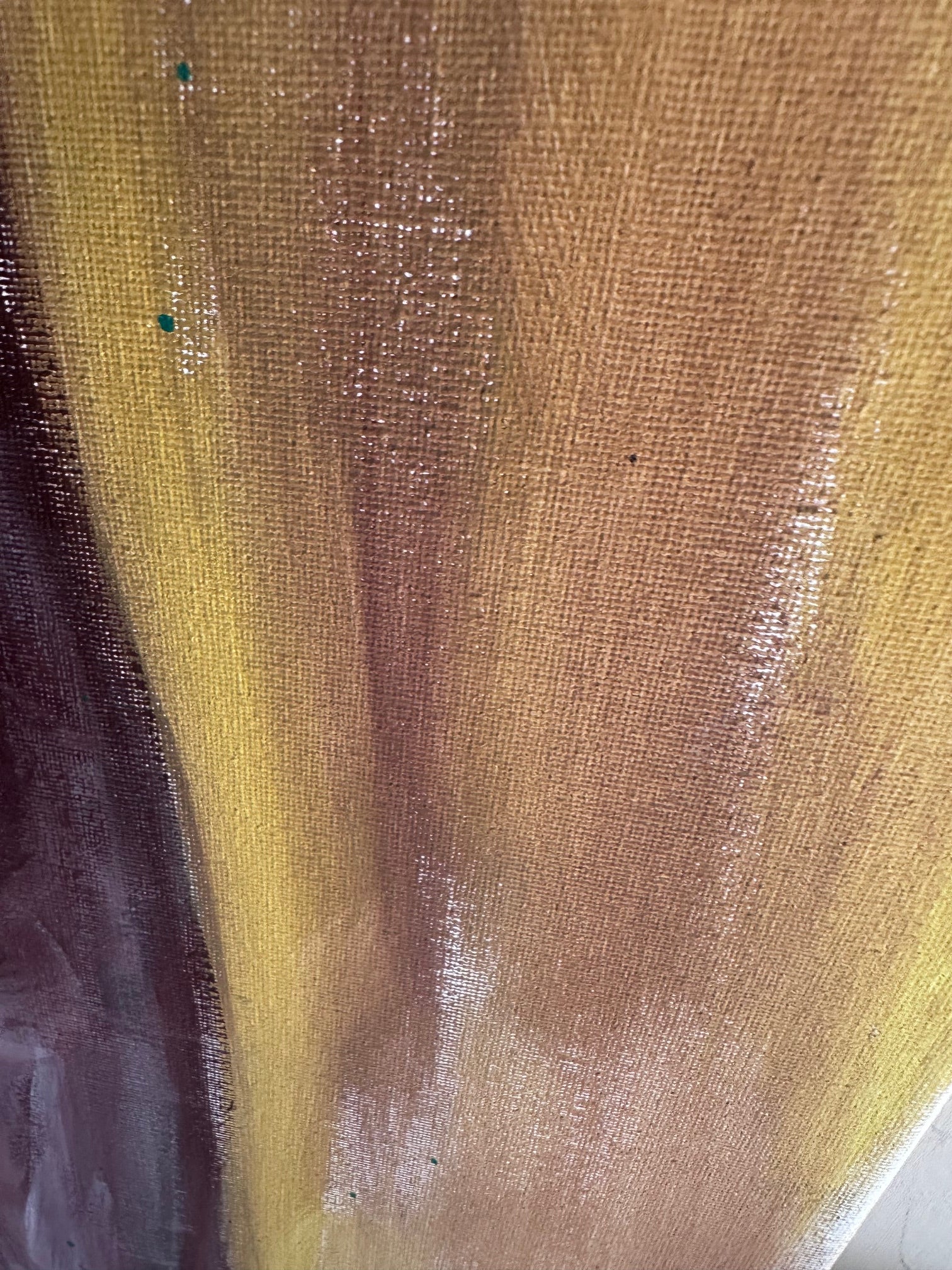 Close-up of a painting with yellow background and nude figure