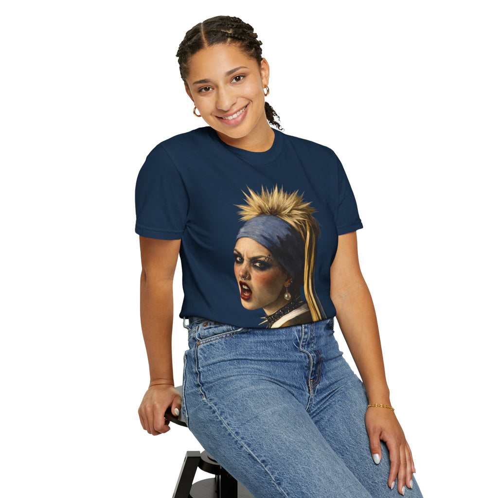Person wearing a navy t-shirt with a reimagined image of Vermeer's girl with a pearl earring sitting on a stool against a white background