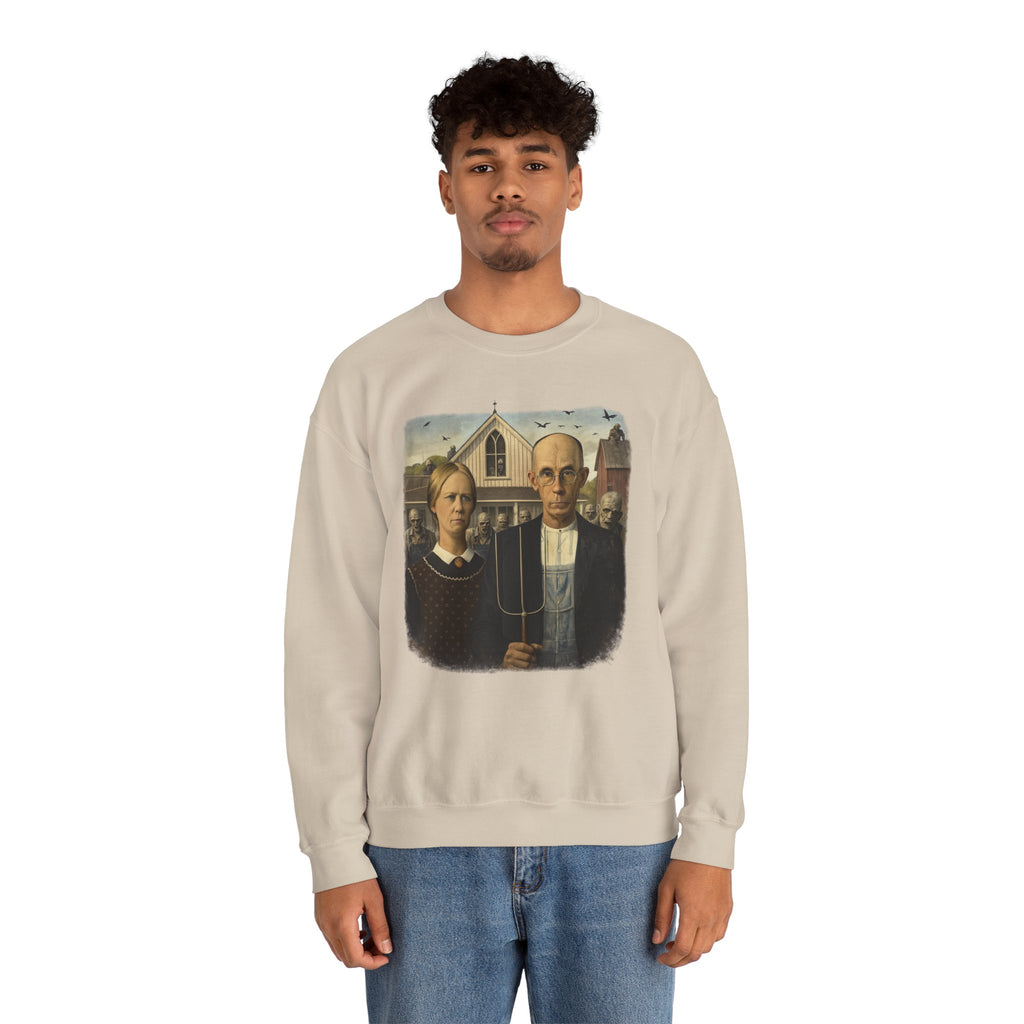 man wearing cream sweatshirt with a reimagined image of American Gothic by Grant Wood on a white background