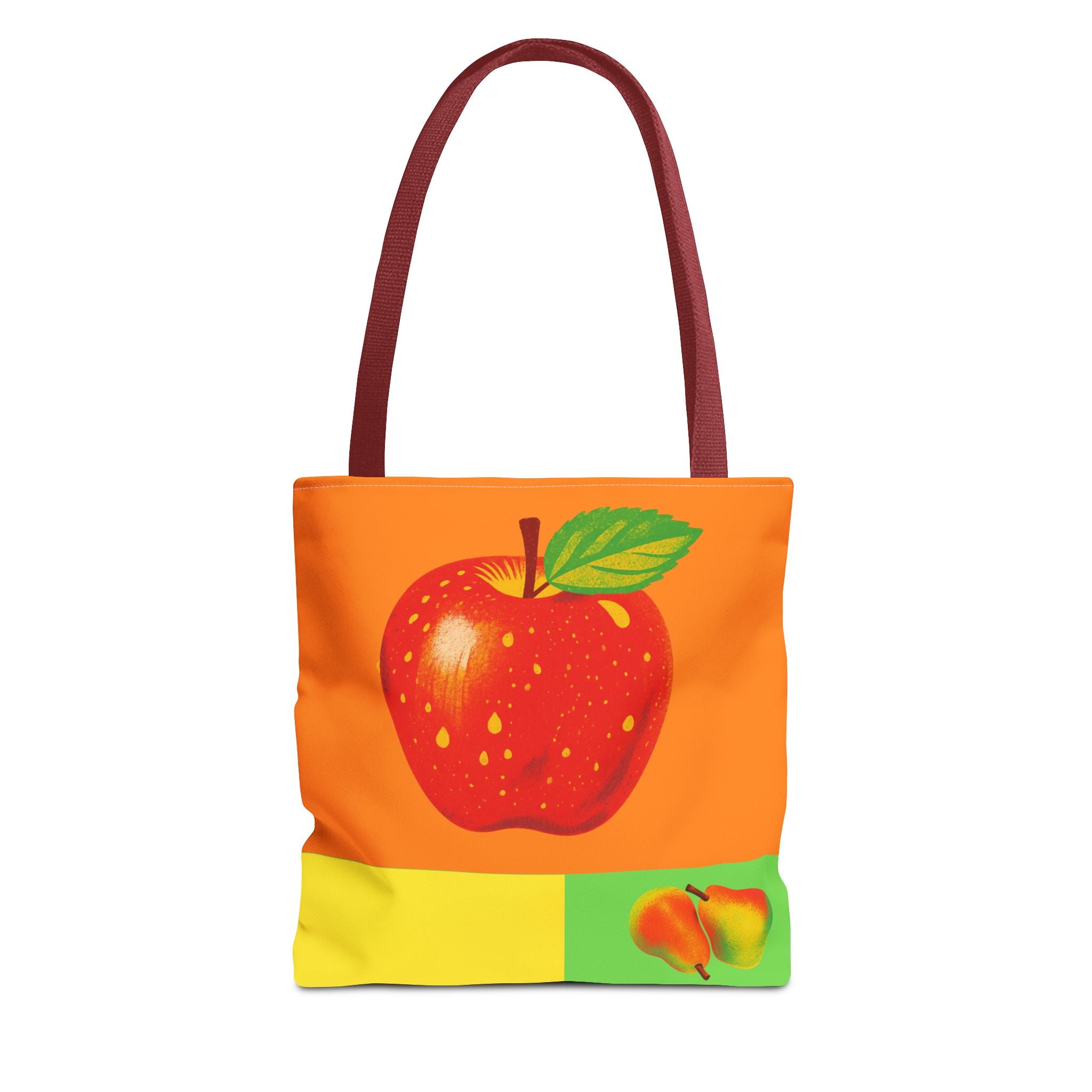 Tote bag with a colour block design showing red apple on orangebackground and pears on a green background 
