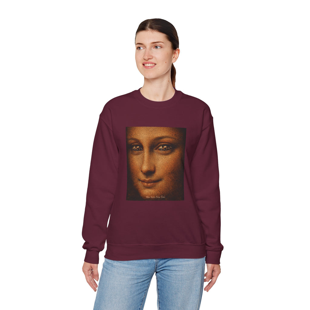 woman wearing a maroon sweatshirt showing a reimagined image of Da Vinci's Mona Lisa on a white background