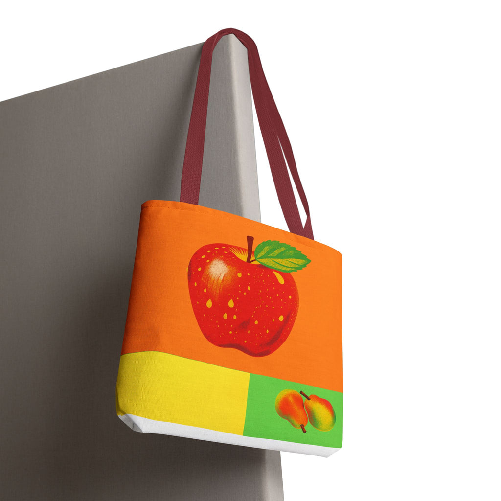 Colorful tote bag with an apple design on a white background