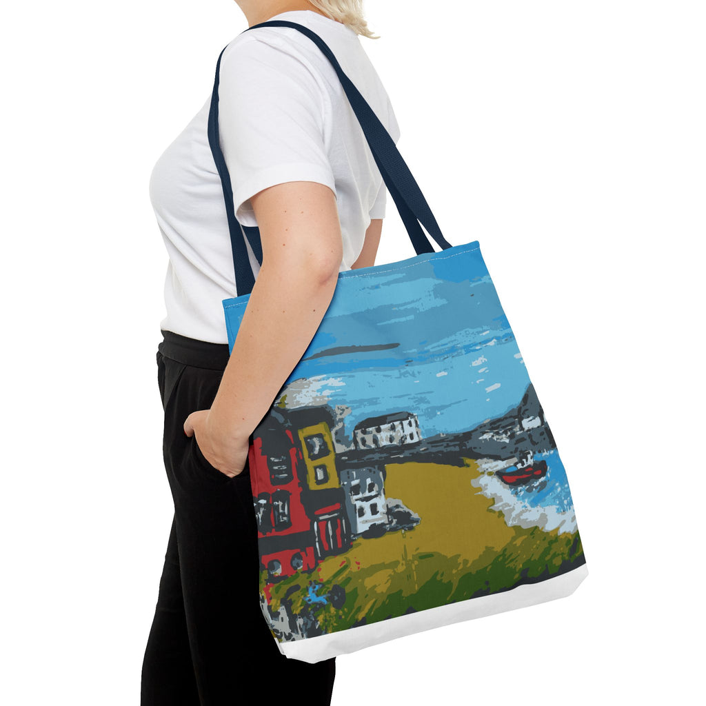 Person holding a tote bag with a colorful painting of a coastal scene from Viking Bay, Broadstairs.