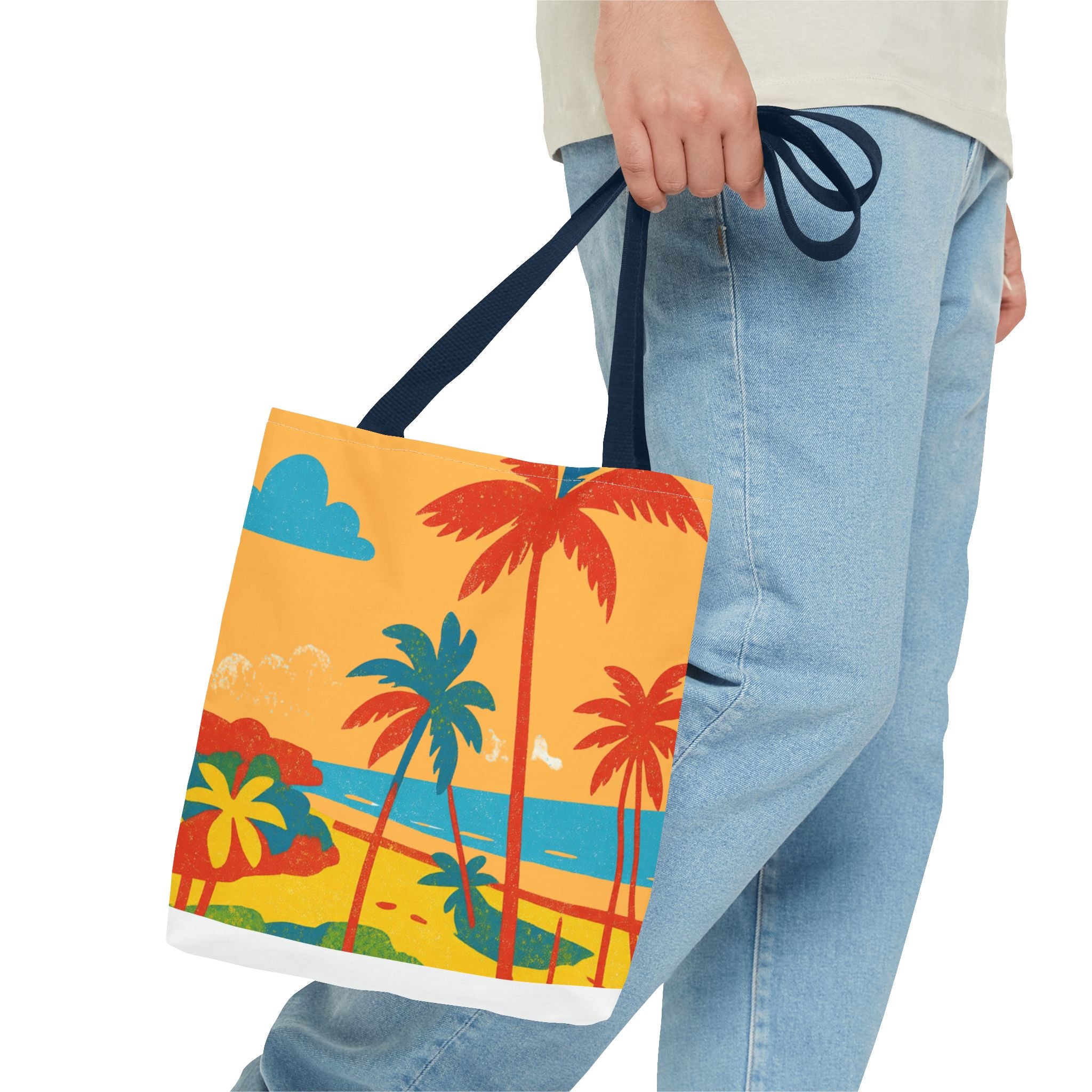 Tote bag with tropical design inspired by St Philip in Barbados held by a person wearing jeans