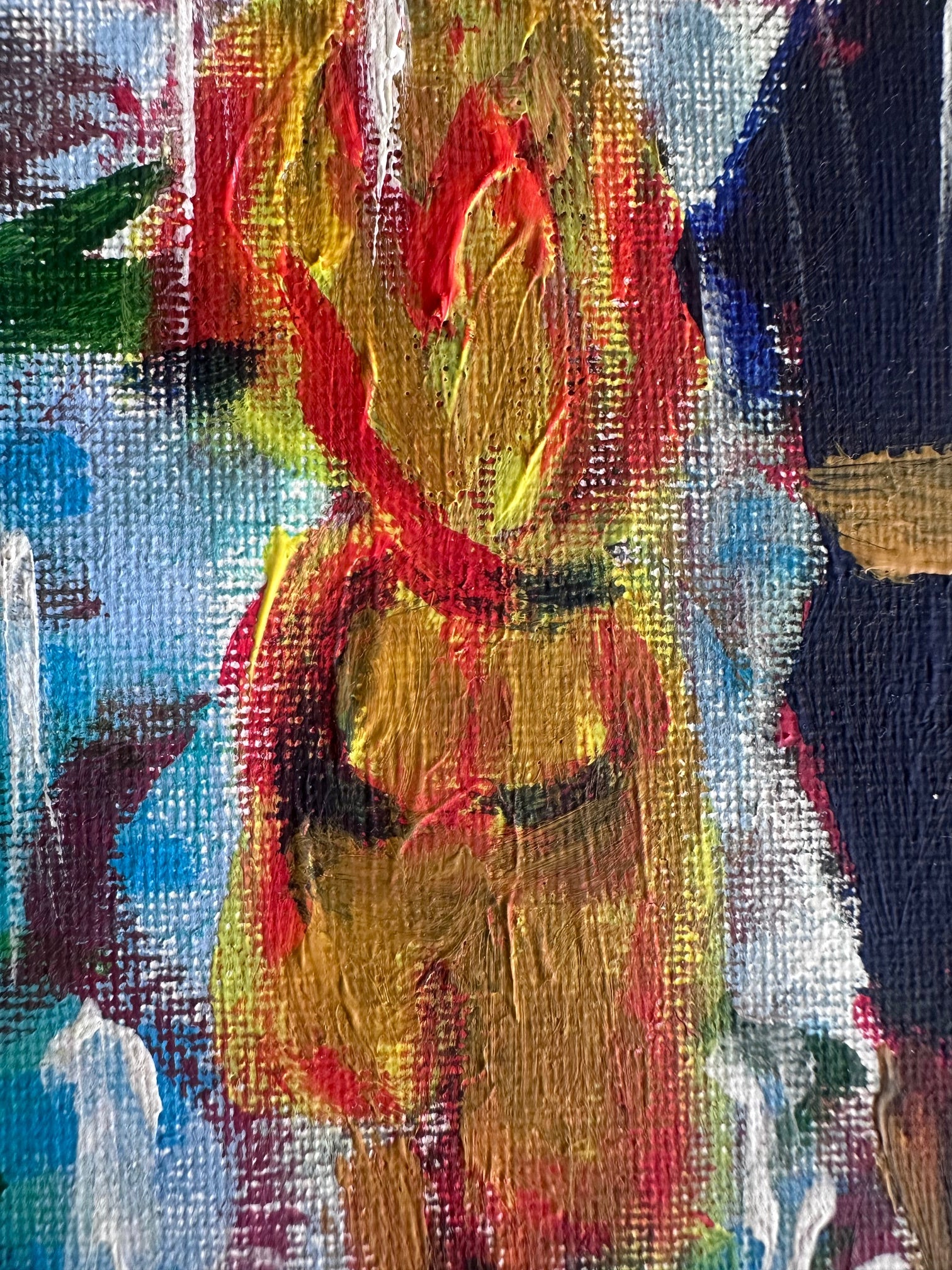 Abstract painting with vibrant colors on a textured surface